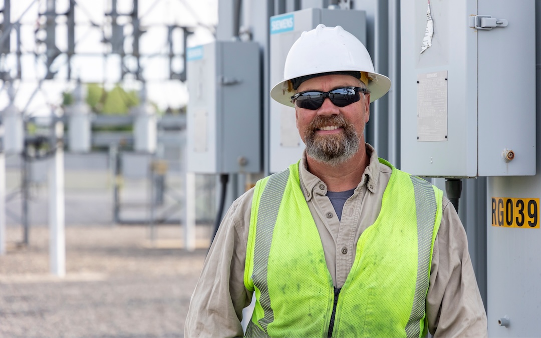 Outage Response: Technology, Teamwork and Safety 1 Person standing near an electrical panel at a transfer station
